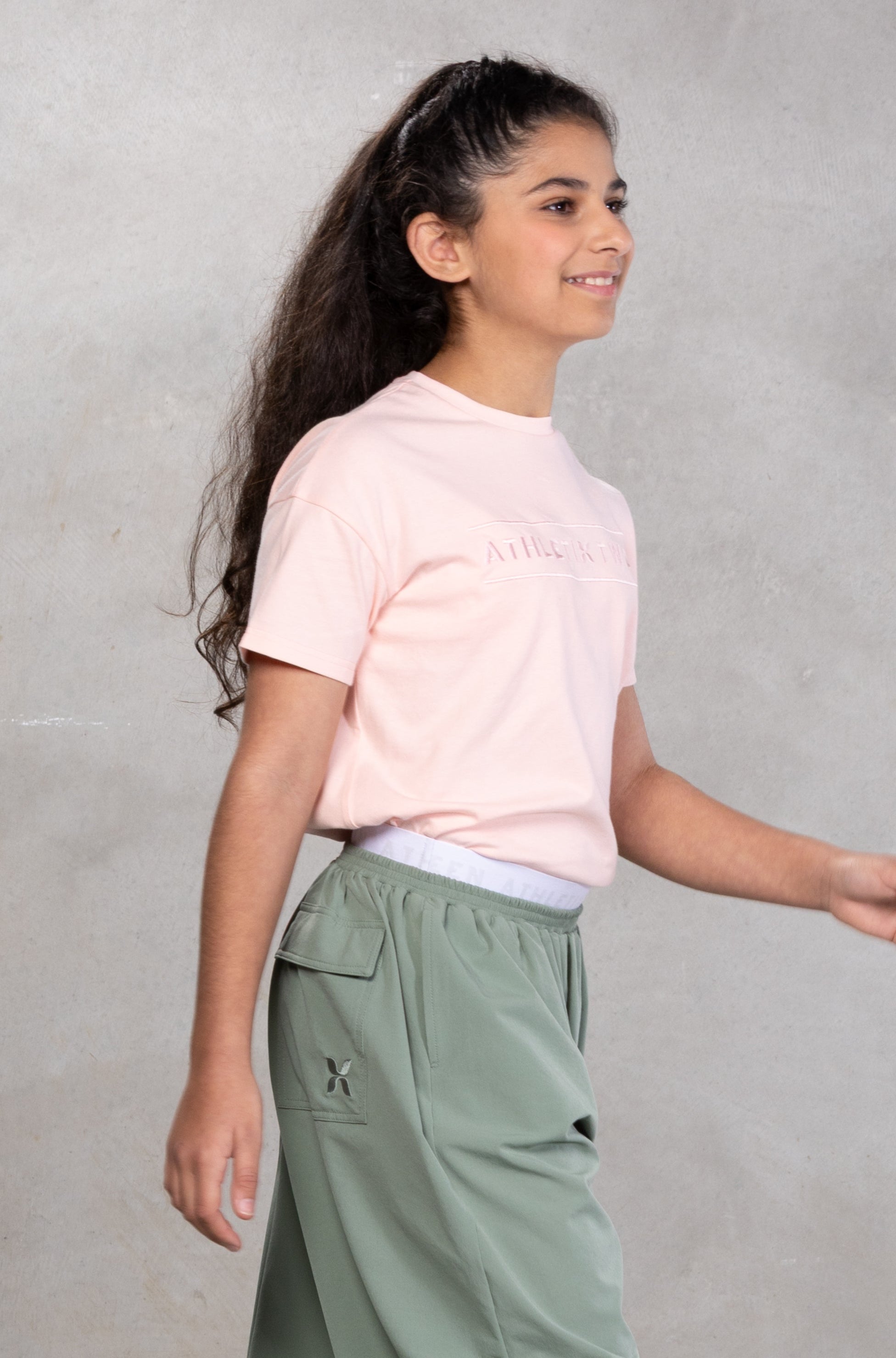 pink tshirt grey lower